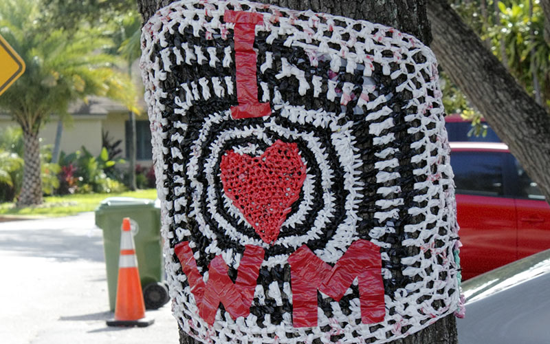 i heart wm crocheted sign on tree wilton manors fl